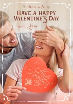 Romantic Happy Valentine's Day greeting card 2021 (with editable text and animation) young man is gifting his girlfriend a heart with greetings - Photo